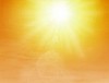 Hot sun on orange sky