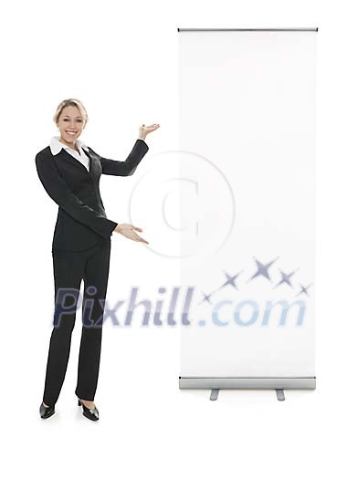 Caucasian business woman beside an empty exhibition display