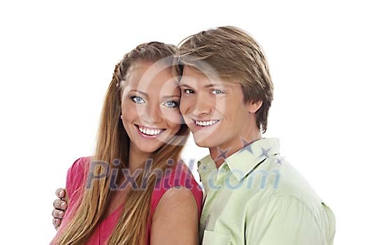 Smiling young couple looking to camera