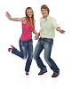 Young couple dancing and smiling on white