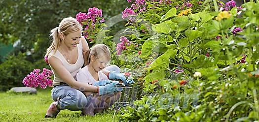 Mother and daughter in garden