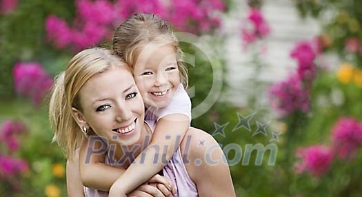 Young girl taking a piggyback ride