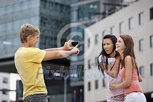 Man taking a foto of his friends