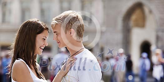 Young couple in the summer city