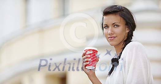 Young woman on a coffee brake Young woman on a coffee brake