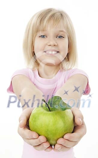 Young girl offering a fresh apple to camera