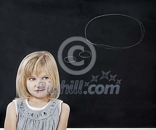 Girl in front of the blackboard