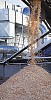 Wood chips falling in industrial process
