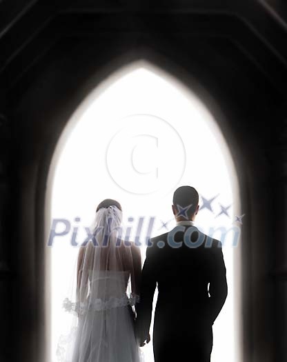 Wedding couple at the church door