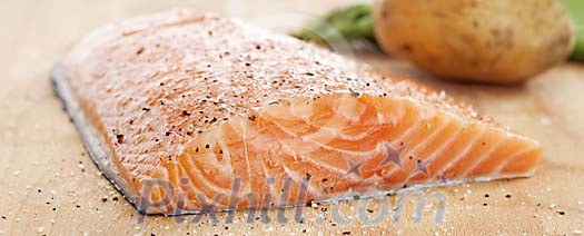 Piece of salmon ready to cook Piece of salmon ready to cook