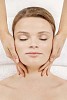 Woman getting a head and face massage