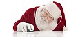 Santa behind table clicking a wireless mouse