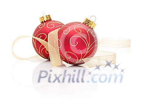 Red christmas balls on a white background
