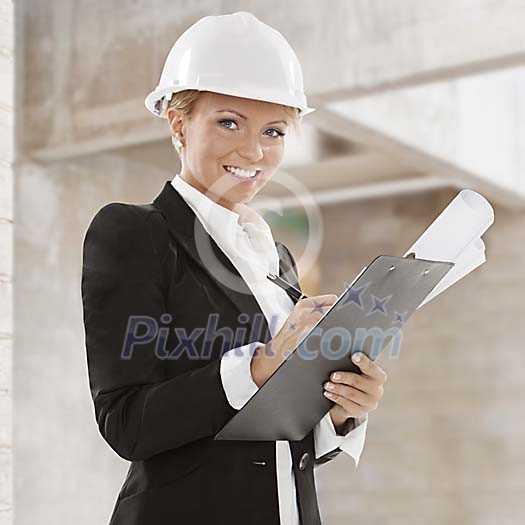 Woman inspecting building site
