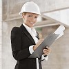 Woman inspecting building site