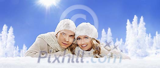 Couple enjoying snowy winter