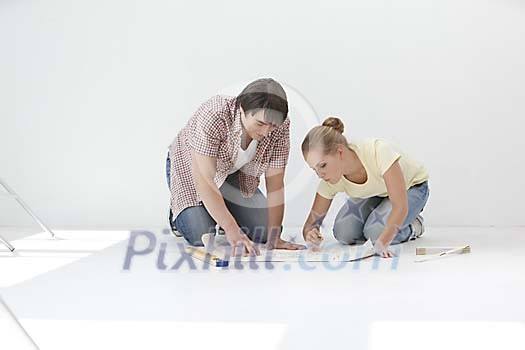 Couple looking at the blueprints