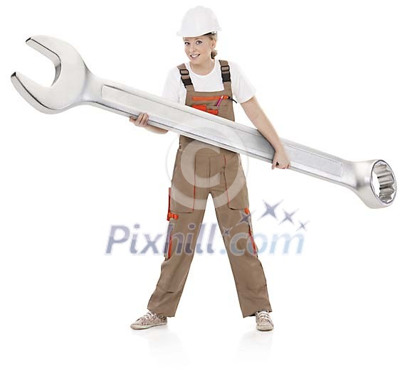 Clipped woman holding a huge spanner