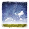 Worn painting of grass and sky