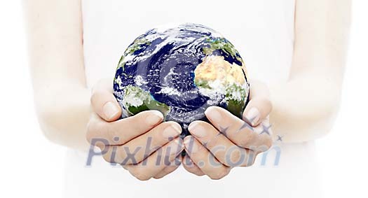 Female hands holding the world