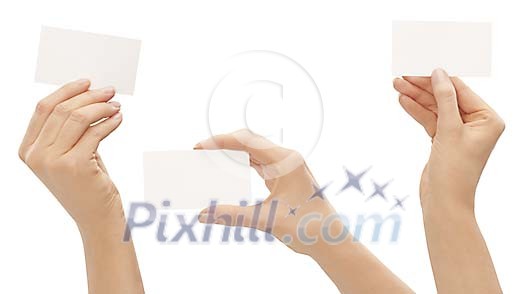 Clipped female hands showing blank businesscards Clipped female hands showing blank businesscards