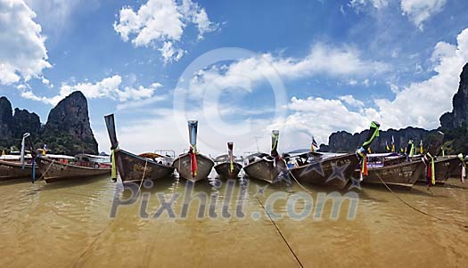 Longtail boats at Railay Beach, Thailand Longtail boats at Railay Beach, Thailand
