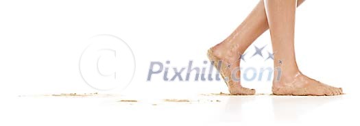 Sandy female feet on a white background