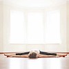 Woman doing splits and lying on the floor