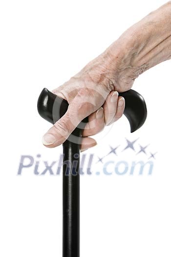 Clipped old hand holding a cane