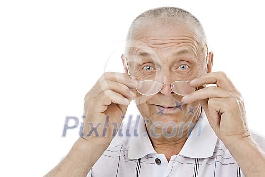 Old man looking over his eyeglasses