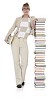 Clipped woman standing next to a tower of books