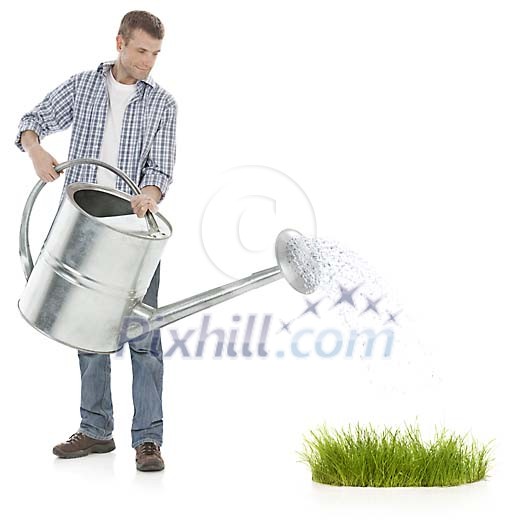 Man watering grass with giant watering can