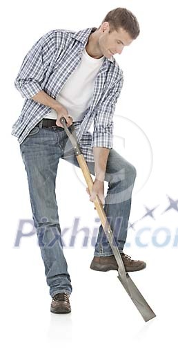 Man digging with showel, hand made clipping path included