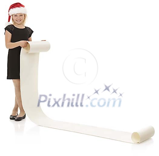 Girl with santa hat holding a very long paper wish list