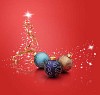 Christmas balls and a star shaped christmas tree on red