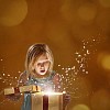 Girl opening christmas gift box