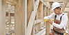 Construction worker measuring