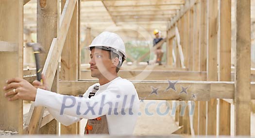 Construction worker hammering Construction worker hammering