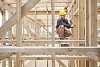 Construction worker working with a drill