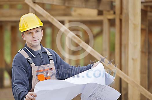 Constructor looking at a plan