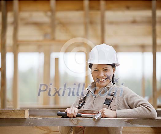 Female constructor looking at camera Female constructor looking at camera