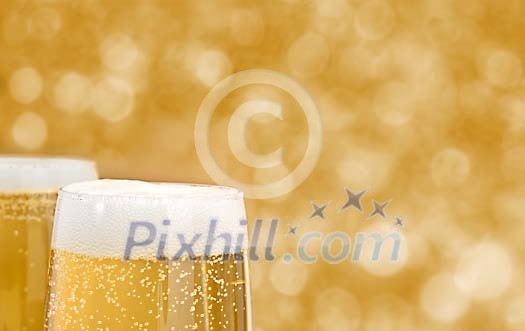 Champagne glasses in bokeh environment