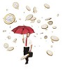 Euro coins falling from the sky on a business guy with umbrella