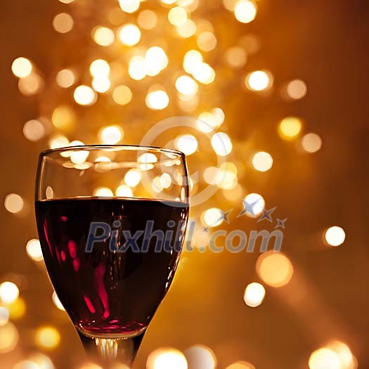 Red wine under christmas lights