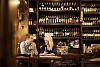 Couple drinking wine at the wine bar