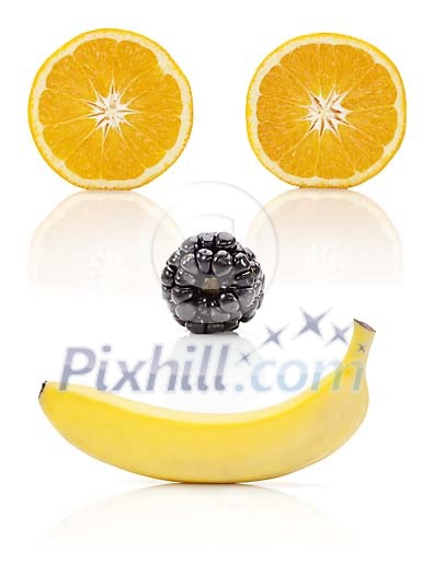 Orange, blackberry and banana forming a smiling face Orange, blackberry and banana forming a smiling face