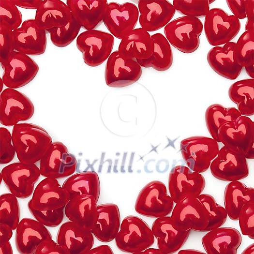 Isolated small hearts forming a big heart in the middle Isolated small hearts forming a big heart in the middle