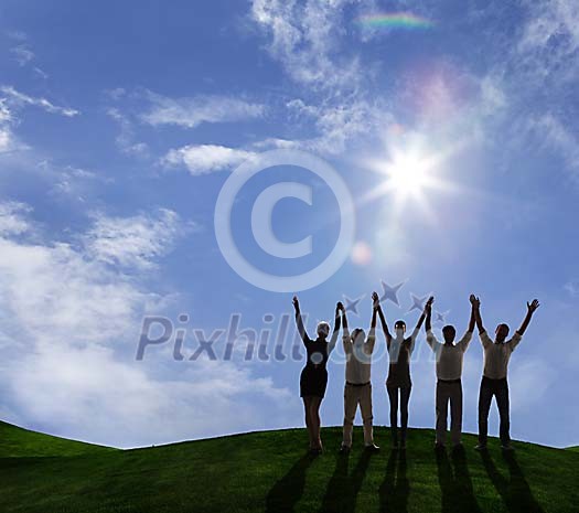 Group cheering outdoors Group cheering outdoors