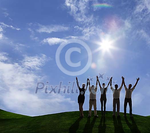 Group cheering outdoors