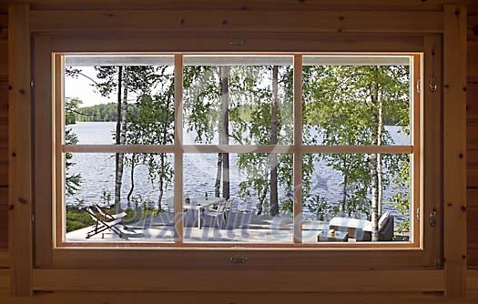 View through sauna window on countryside View through sauna window on countryside